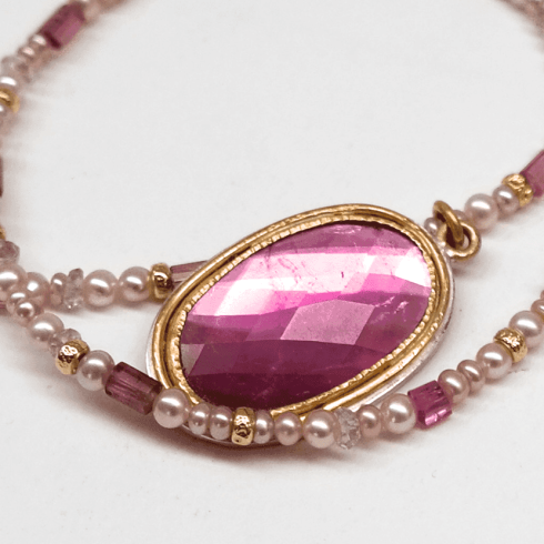 Neckless ovoid sissor cut pendent mauve l
